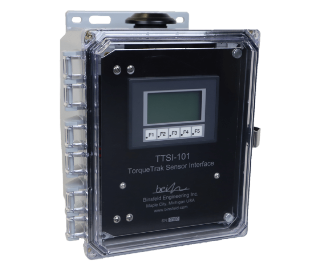 TORQUETRAK TTSI torque sensor interface module mounted on DIN rail inside a control cabinet